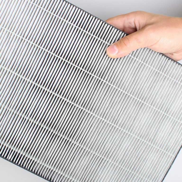 air filter in hand background light