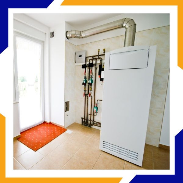A new, white furnace unit installed neatly in the corner of a tiled utility room with ductwork.